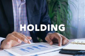 Holding: cos'è, vantaggi, svantaggi e come costituire